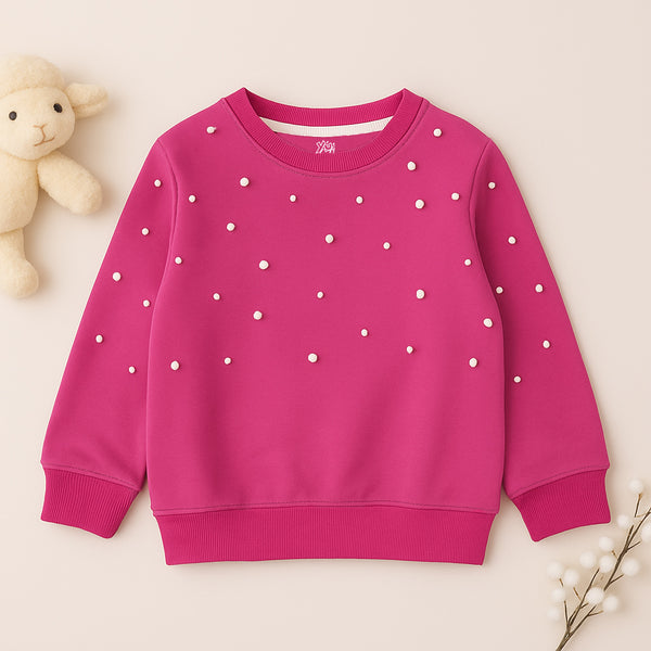 Pink fleece sweatshirt for girls with white pearl embellishments – Yumi.pk